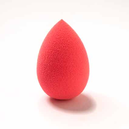 Makeup blender sponge in orange color