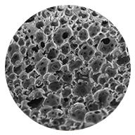 A close up image of porous form with is made from a plastic polymer